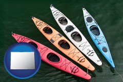 colorado map icon and four colorful fiberglass kayaks