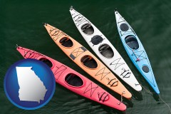 georgia map icon and four colorful fiberglass kayaks