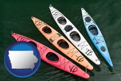 iowa map icon and four colorful fiberglass kayaks