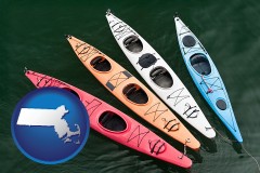 massachusetts map icon and four colorful fiberglass kayaks