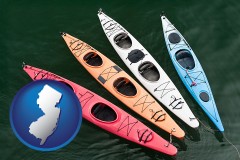 new-jersey map icon and four colorful fiberglass kayaks