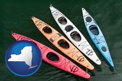 new-york map icon and four colorful fiberglass kayaks